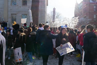 Cover image for Lowell Student Holds Sign