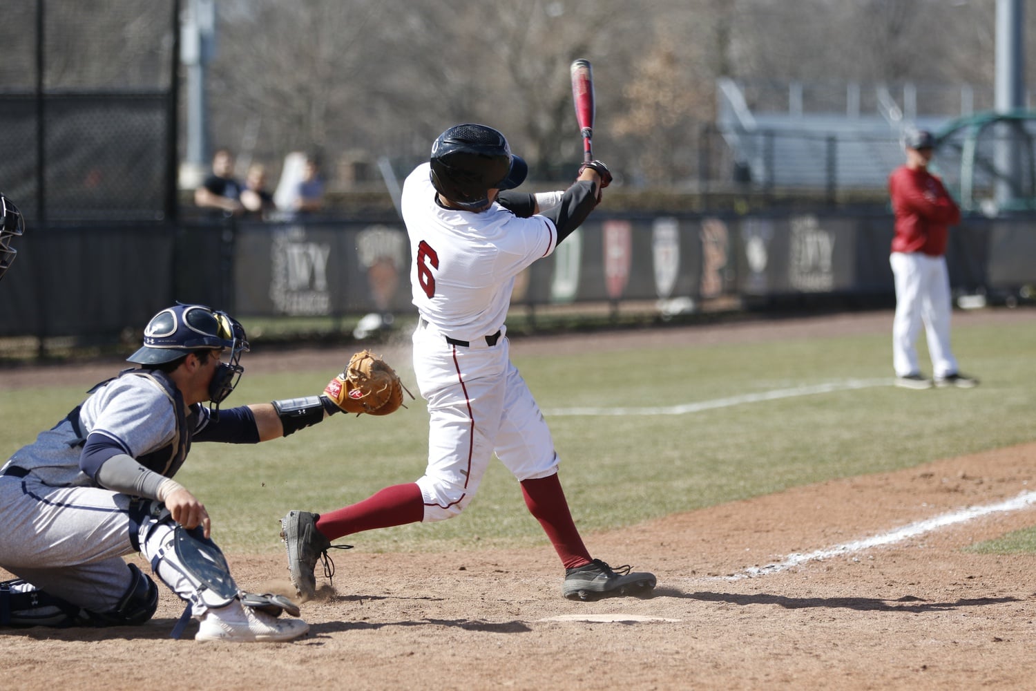 Then-junior Chad Minato takes a swing against Yale on April 6, 2019.