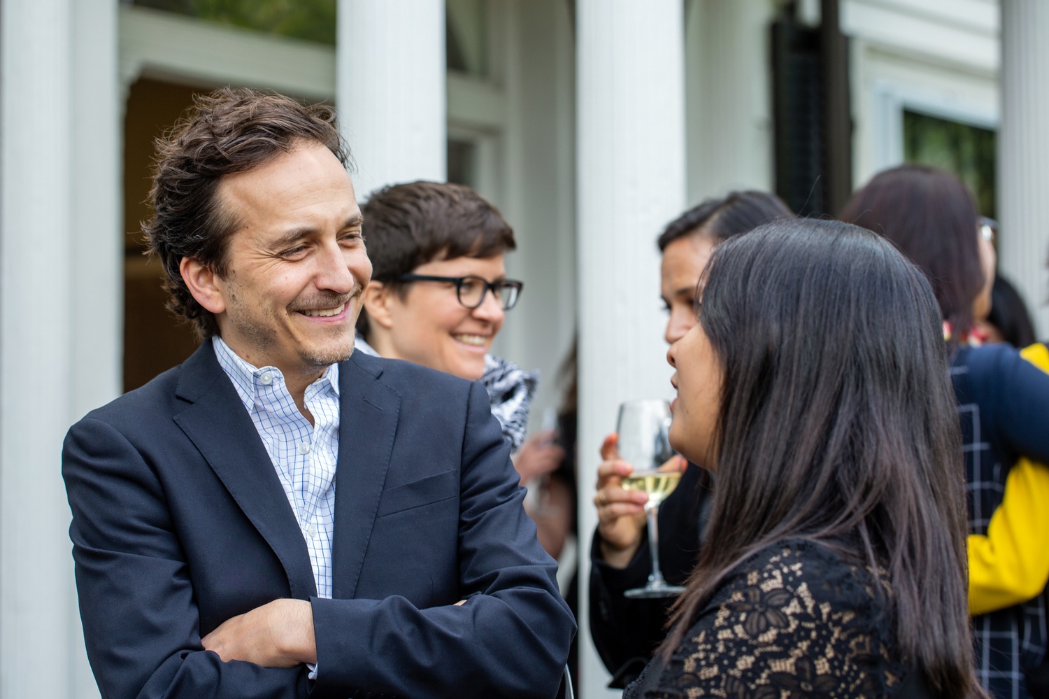 Brent Renaud, left, pictured at a Nieman Foundation event in 2019.