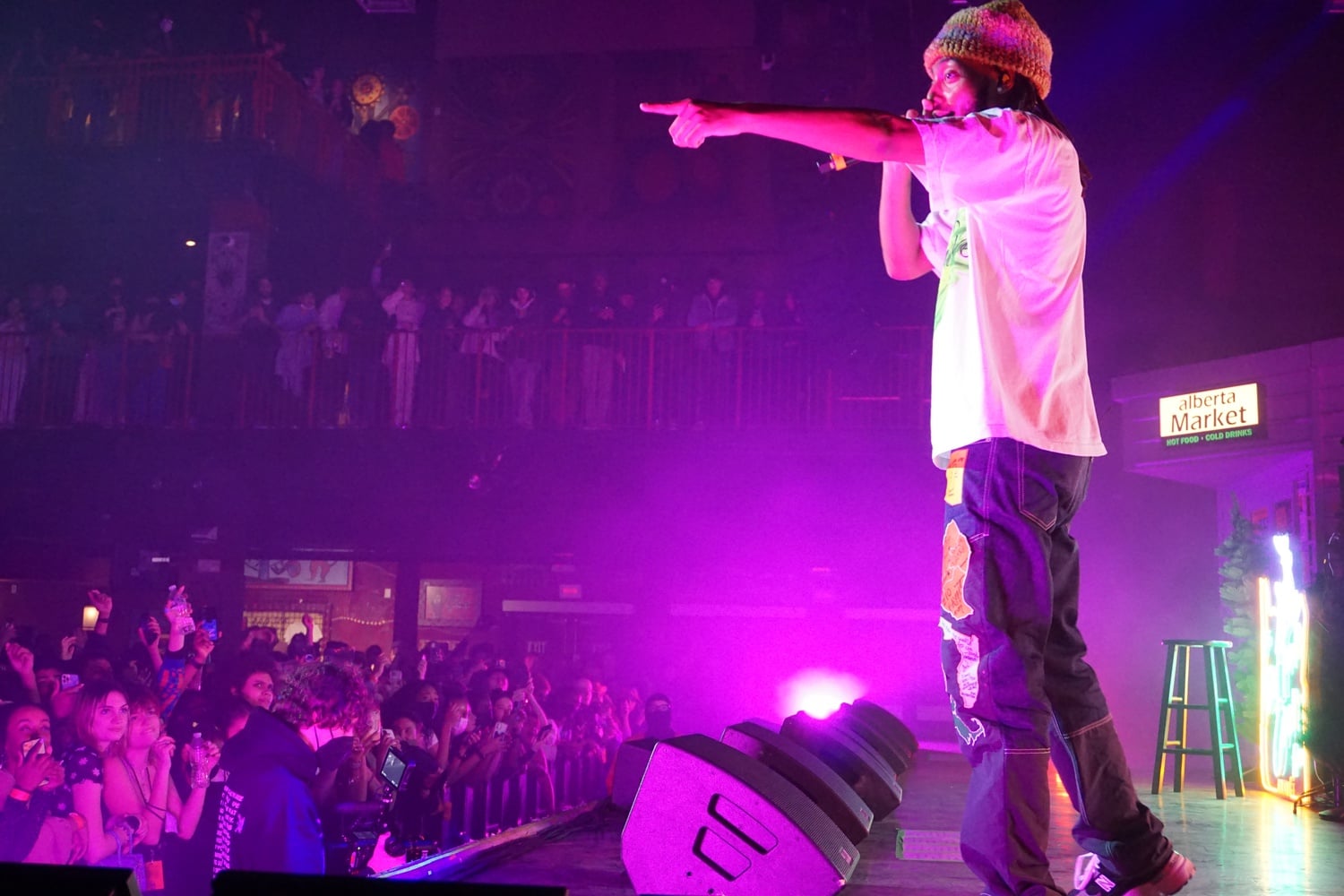Aminé vibes on stage with his fans.