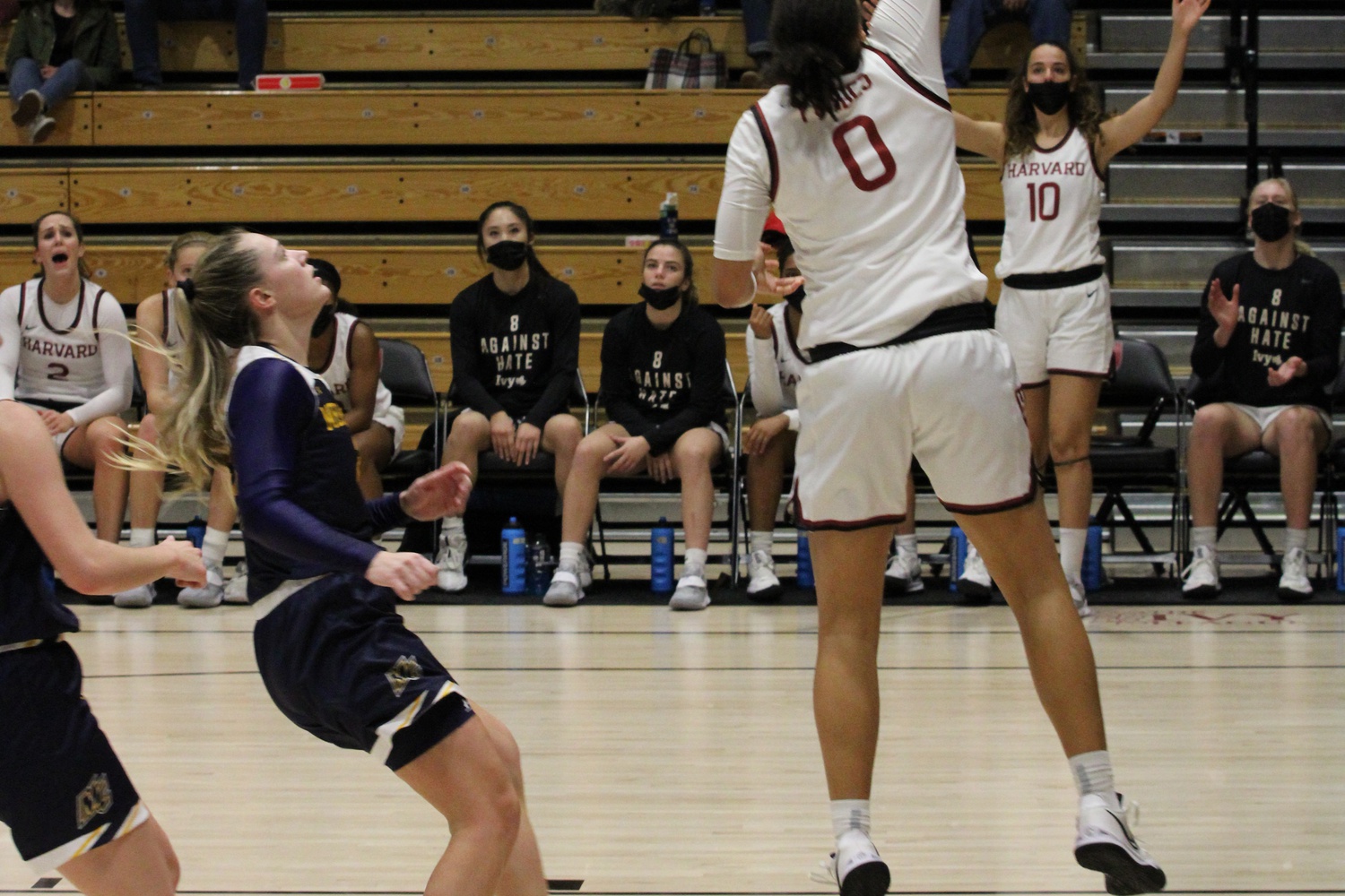 Junior guard McKenzie Forbes lays the ball in in a 99-75 victory over Merrimack on Nov. 30, 2021. The first weekend of Spring Break, Forbes' 22 points were not enough to lead the Crimson to victory.