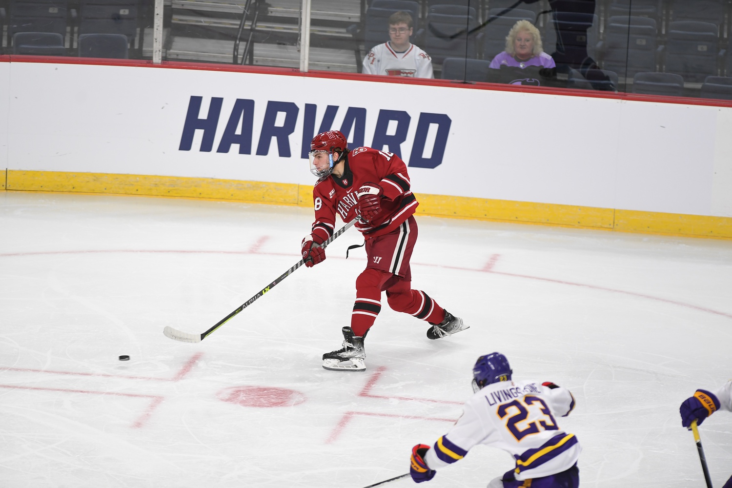 Sophomore forward Alex LaFerriere fires a shot during the 4-3 loss to Minnesota State that eliminated Harvard from the NCAA Tournament. LaFerriere scored near the end of the second period to cut the Crimson's deficit to one.
