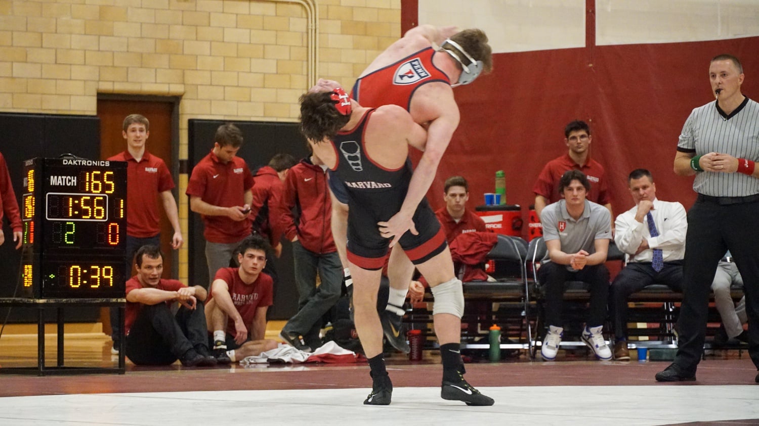 Conigliaro picks up his opponent before slamming him to the mat in the Crimson's match against the University of Pennsylvania on Feb. 1, 2020.