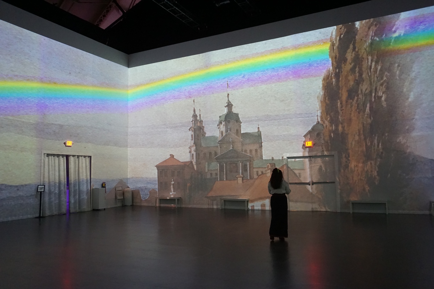 Gallery-goer viewing the "Immersive Shevchenko" Exhibition.