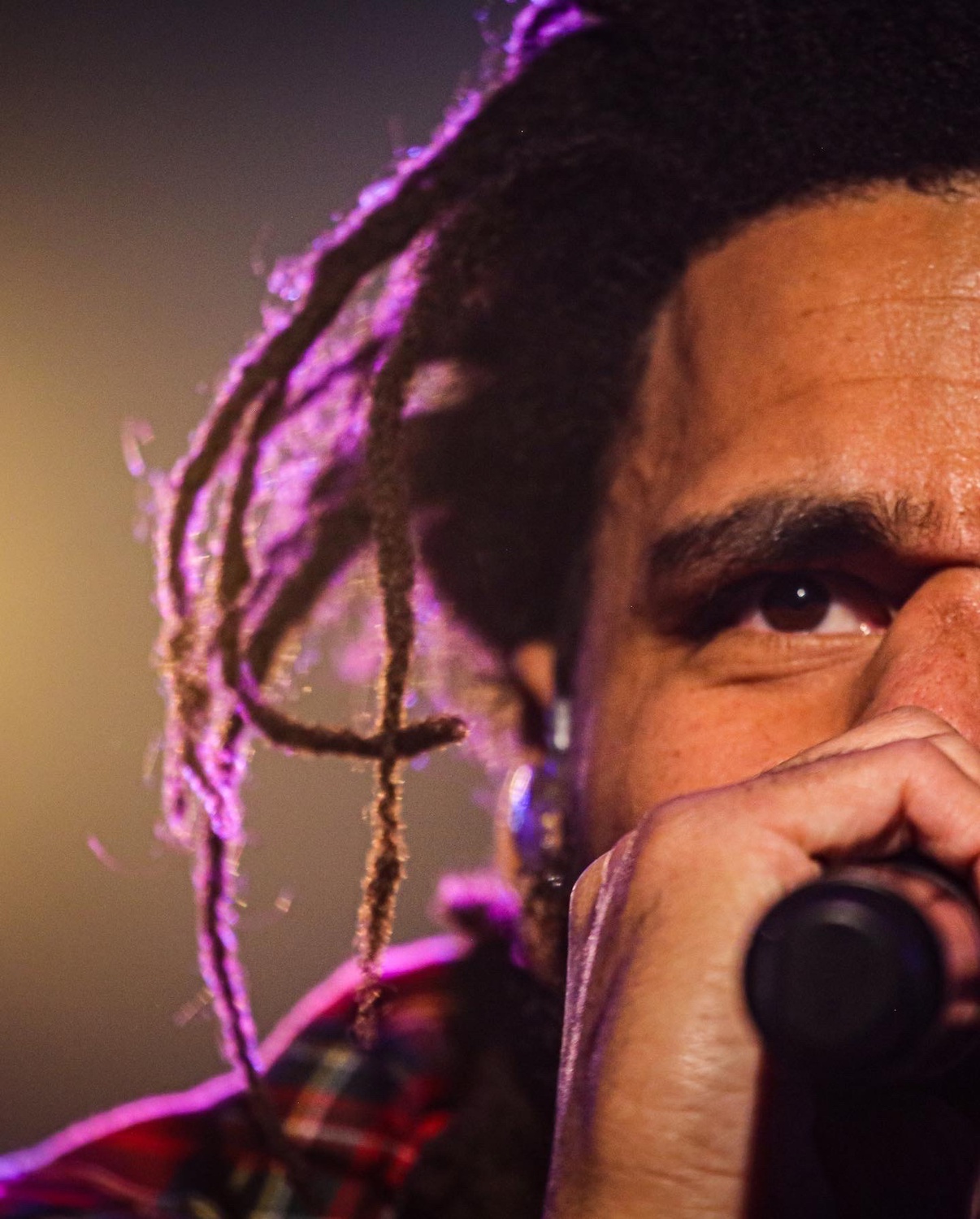 A close-up look at J.Cole, founder and main headliner of Dreamville Festival, on stage at Dreamville 2022.