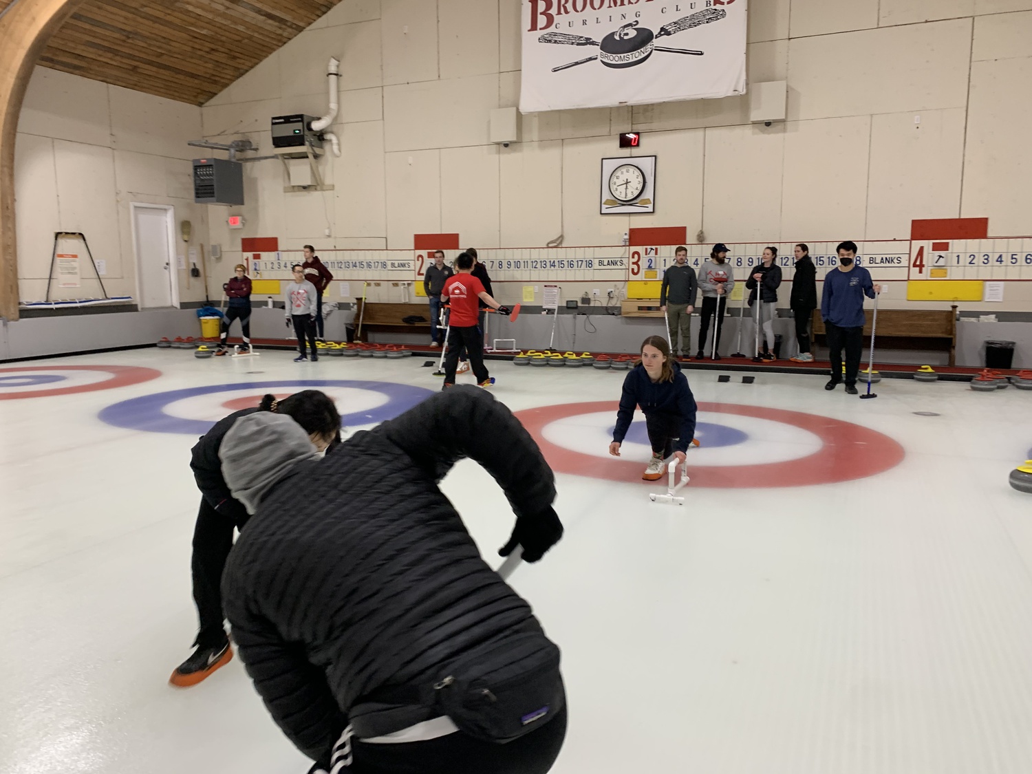 Curlers in action at the Broomstones curling rink.