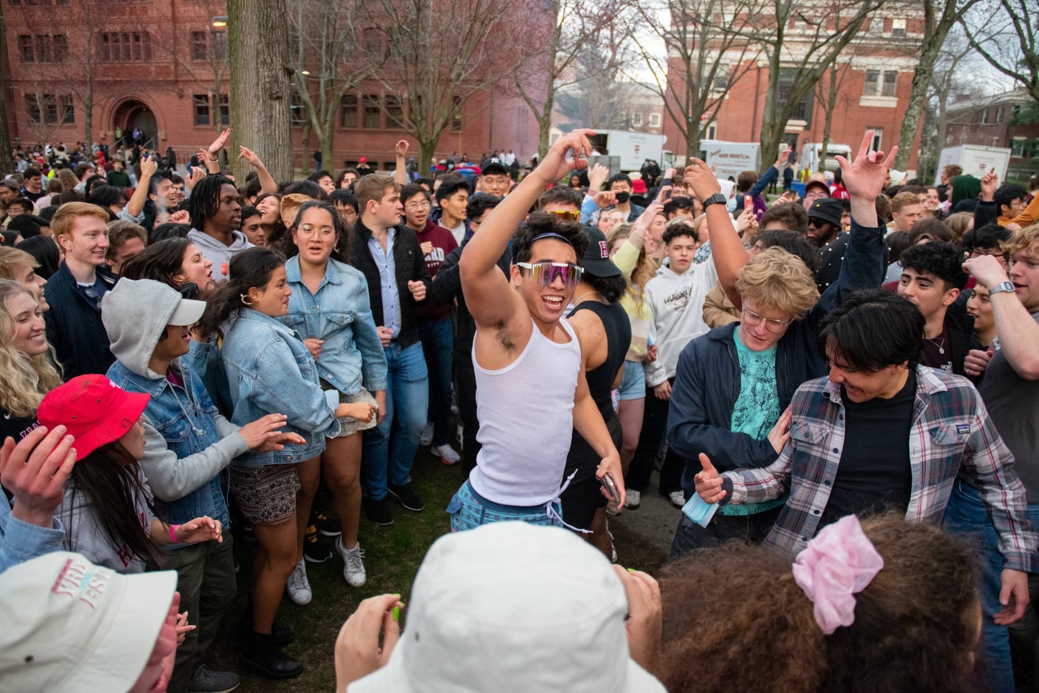 Students in the crowd jumped and fist-pumped as they enjoyed the loud live music in the typically quiet Yard.