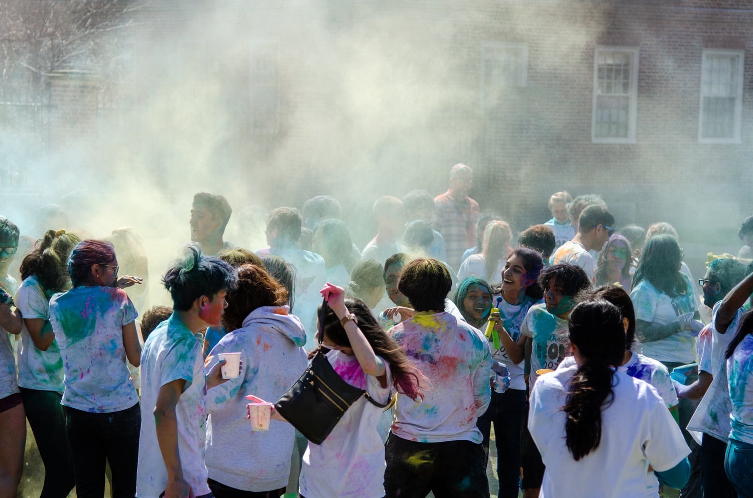 Students celebrate Holi on the Mac Lawn.