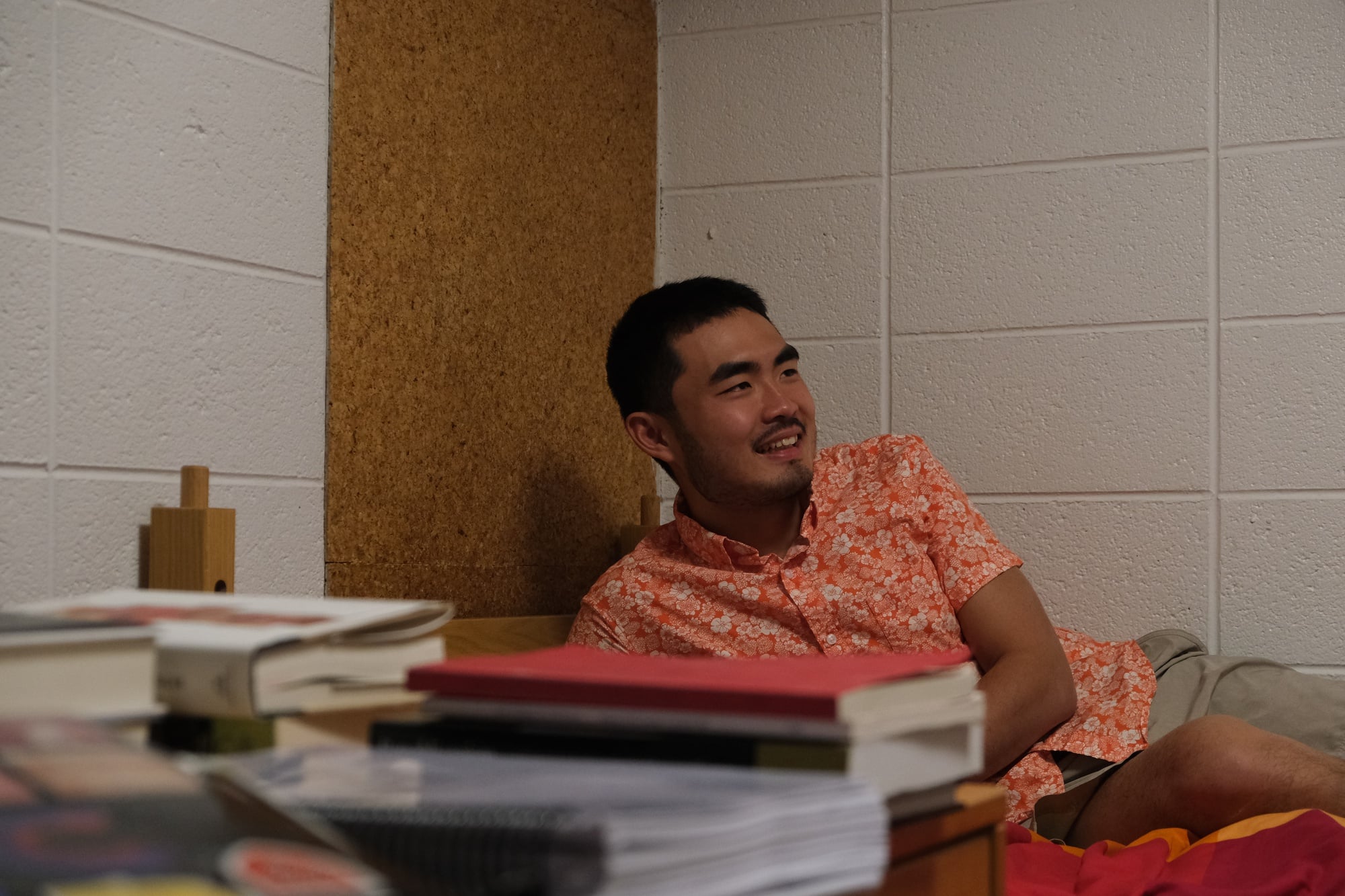 Michael pictured in his Quincy dorm room.