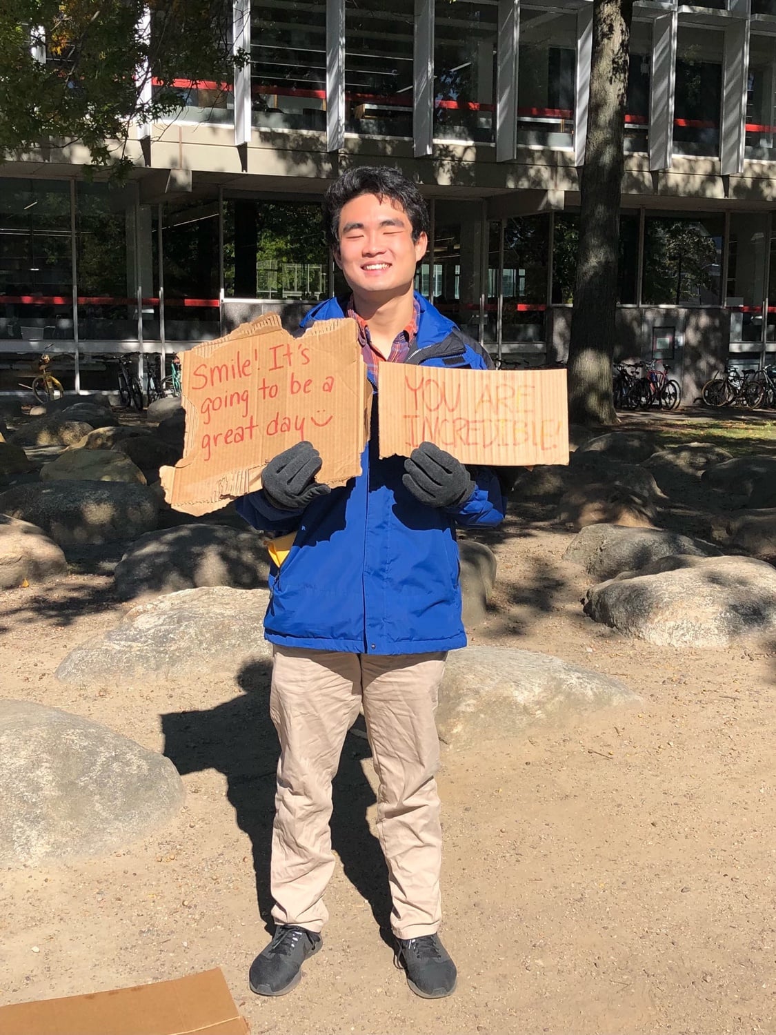 In his freshman fall, Michael stood in the Science Center Plaza offering free hugs to passersby.