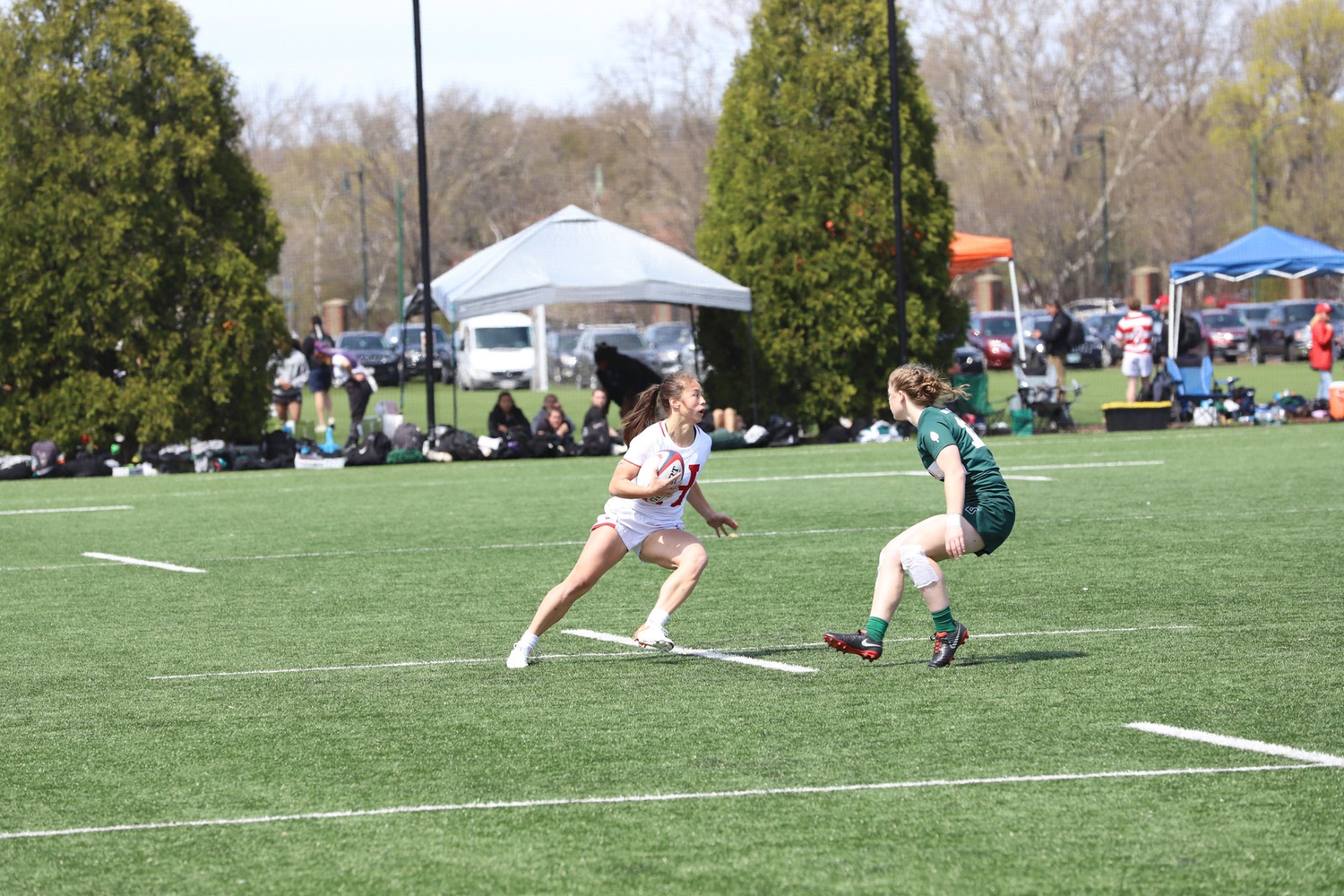 Senior center Sofie Fella sizes up her Dartmouth defender during the 2022 Ivy 7s Tournament on April 23. Fella scored eight tries for the Crimson throughout the weekend as she led the team to its second straight tournament title.