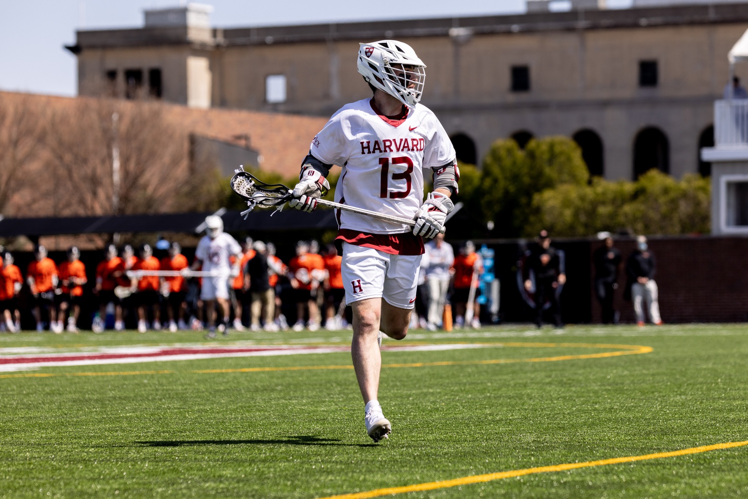 First year attacker/midfielder Owen Gaffney runs up the field during the 19-16 comeback win over Princeton on Saturday. Next weekend, the Crimson, currently in a five-way tie for first, will face Yale in New Haven, Conn.