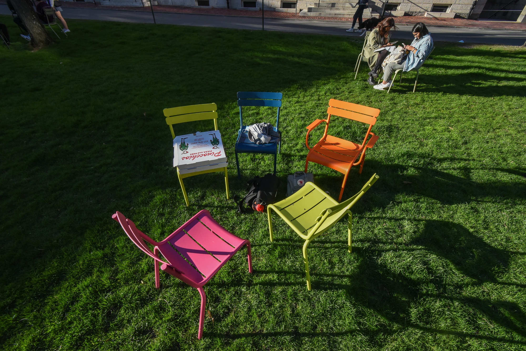 Pastel-colored chairs dot the Yard, inviting students to sit and relax.