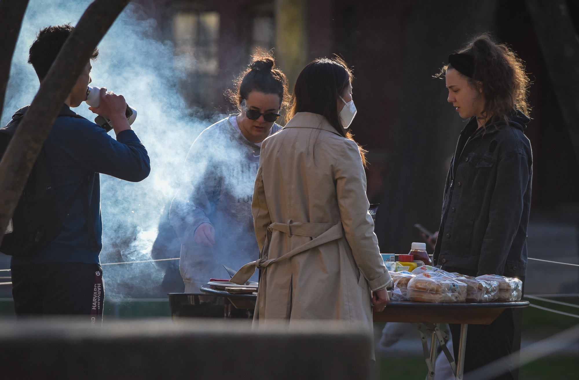 Students make the most of the springtime weather by socializing outdoors.
