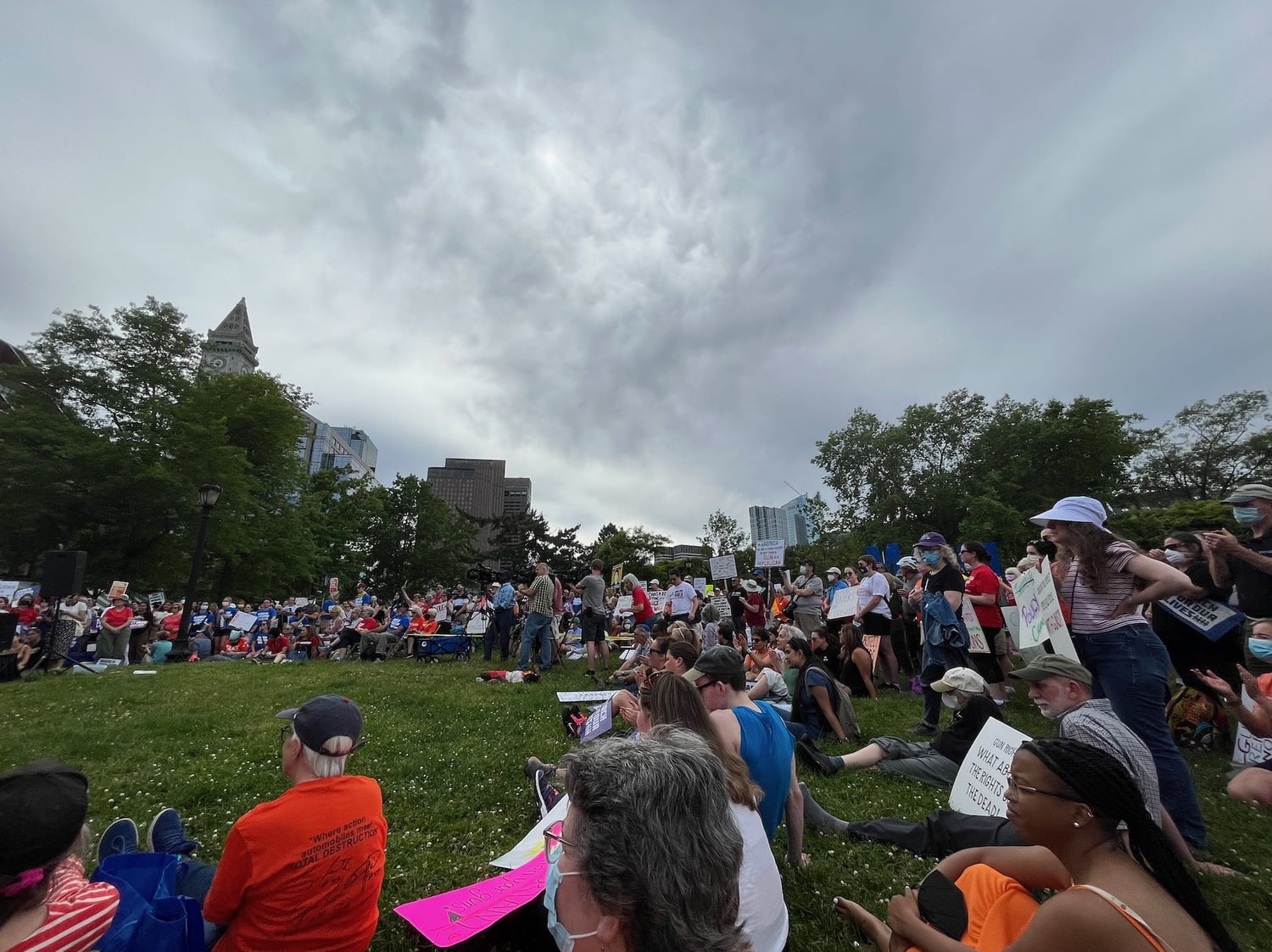 Attendees, many holding handmade signs, convened near the waterfront in downtown Boston on Saturday afternoon to hear speakers and urge legislative action on gun control.
