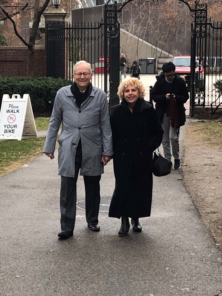 Dale and his wife of over 50 years, Linda, walk through Harvard Yard.
