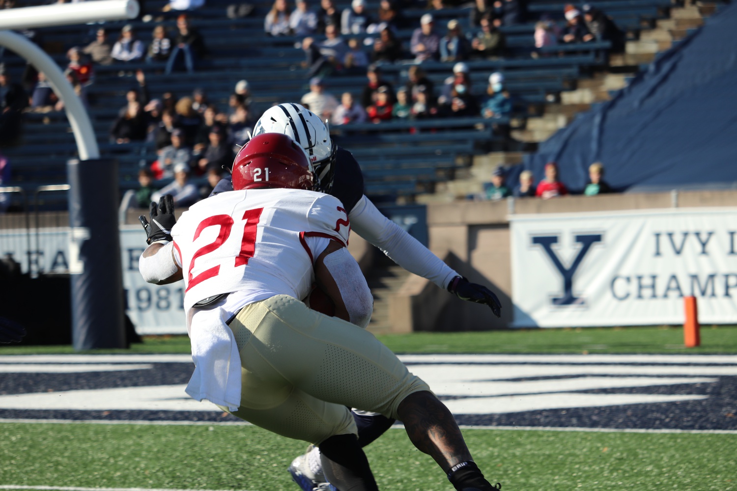 Junior running back Aidan Borguet rushes in a 34-31 victory over Yale on Nov. 20, 2021. Borguet, who carried for 602 yards and eight touchdowns last season, is set to take over the feature back role in 2022.