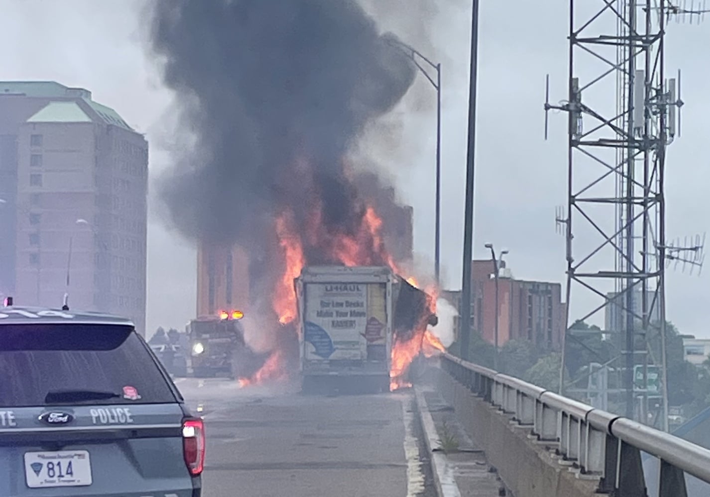 A U-Haul truck carrying mattress toppers set to be delivered to Harvard students caught fire on the Massachusetts Turnpike on Monday.