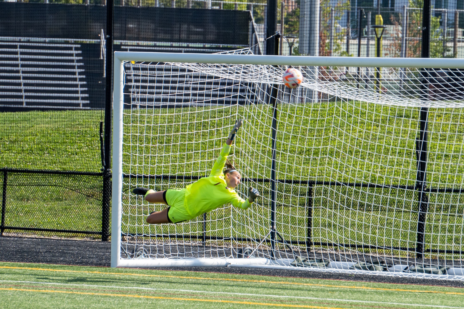 Junior goalkeeper Anna Karpenko makes a diving save attempt late in the first half, yet Northeastern finds the net to tie the game at 2-2. Karpenko answered with a key save in the second half to preserve the 3-2 lead, for a total of three saves on the game.