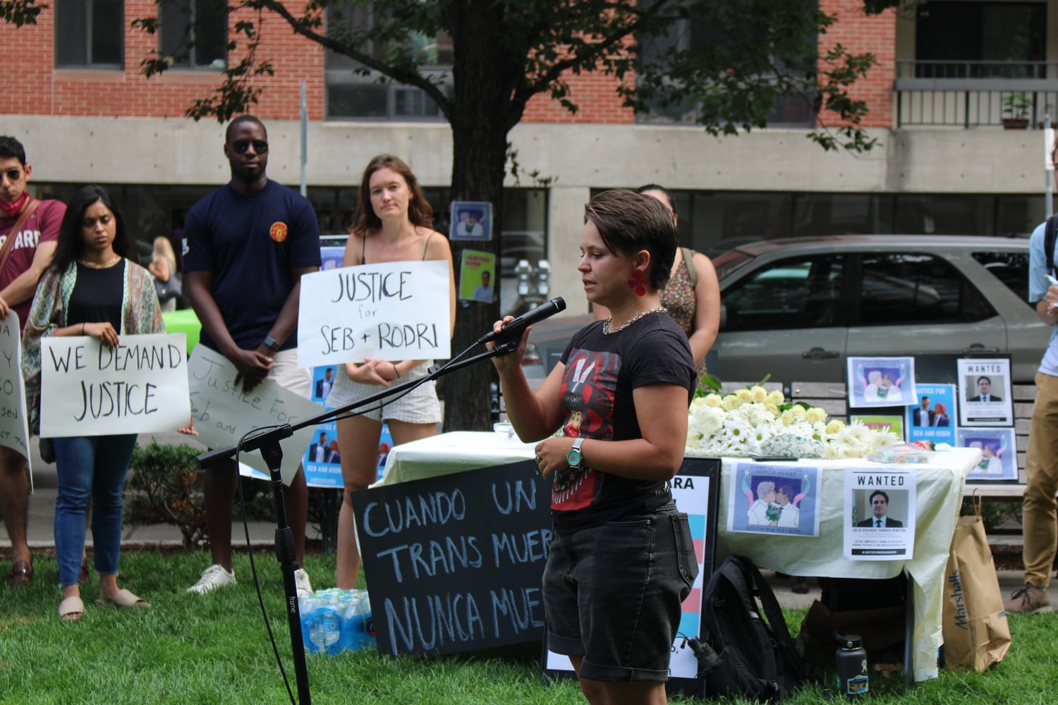 Vic Hogg, co-organizer of the rally for Rodrigo Ventocilla Ventosilla and a student at the Harvard Kennedy School, speaks before the crowd gathered near the Peruvian consulate in Boston.