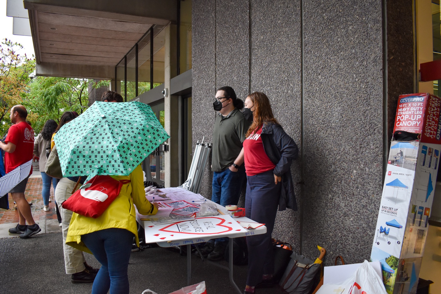 Students sign petitions outside the Science Center.