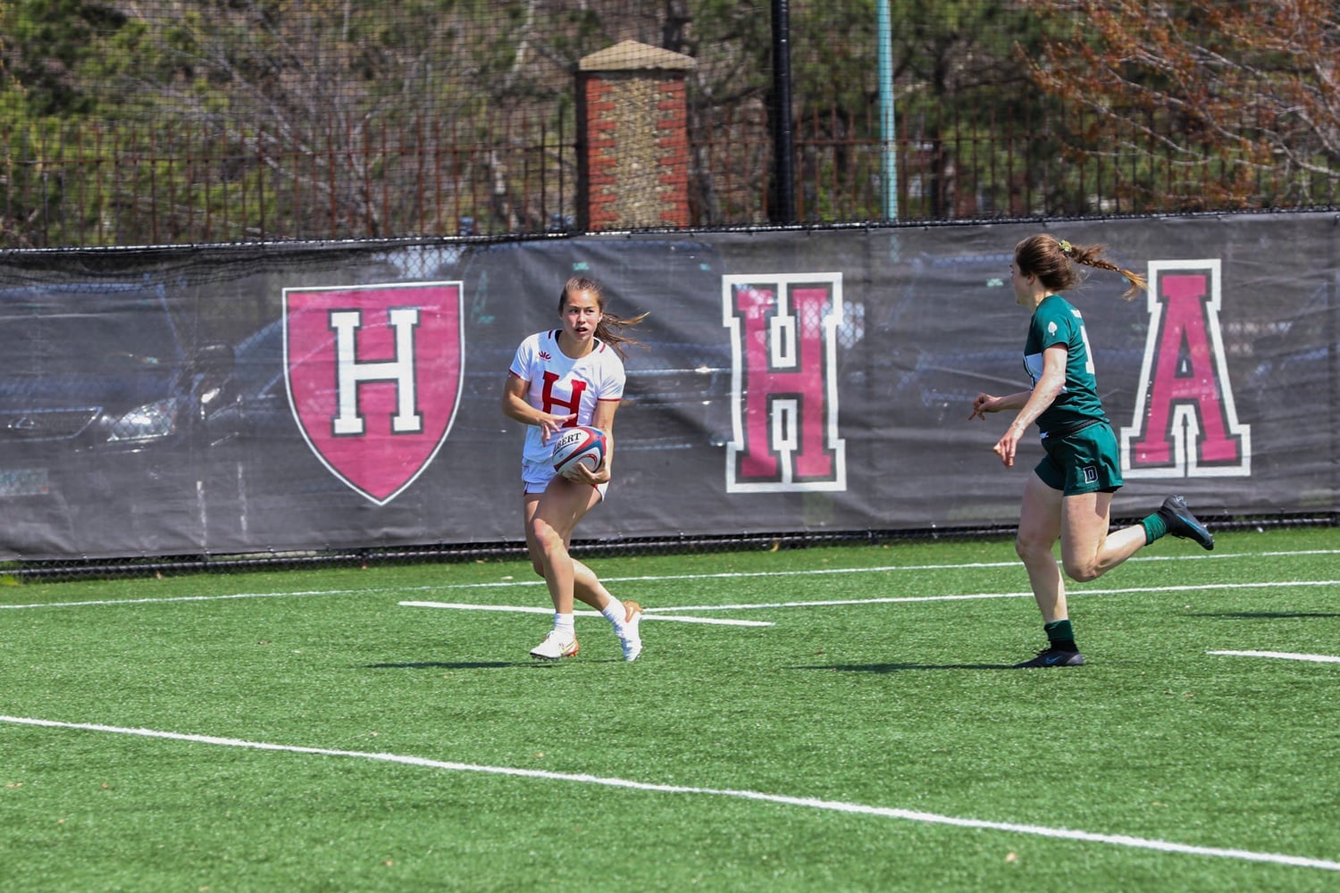 Then-senior Sofie Fella runs with the ball in the Ivy 7s Championship Game against Dartmouth on April 23, a 24-17 victory for the Crimson in which Fella scored two tries.