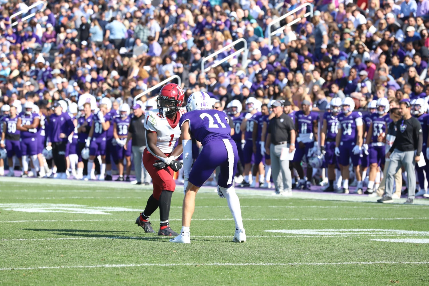 Senior wide receiver Kym Wimberly lines up for a route in a 38-13 victory over Holy Cross on Oct. 2, 2021 in Worcester, Mass. Wimberly is among the returning stars of a Crimson team that will open play on Friday against Merrimack.