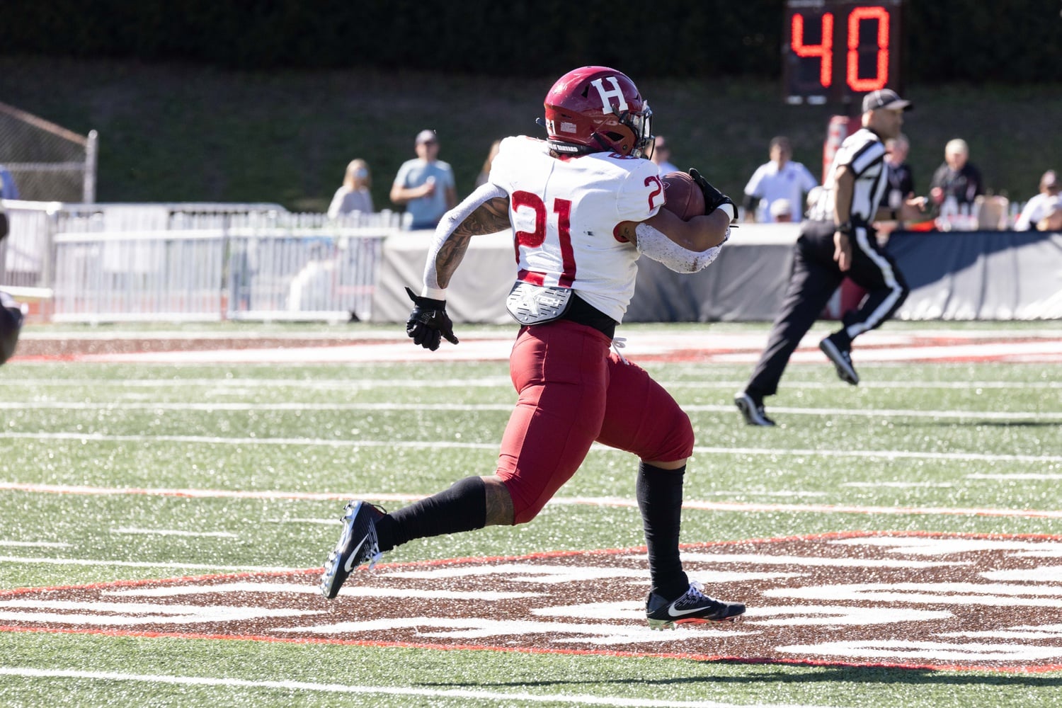 Senior running back Aidan Borguet breaks free for a 67-yard touchdown run that turned out to be the decider in Saturday's 35-28 victory over Brown in Providence, R.I.