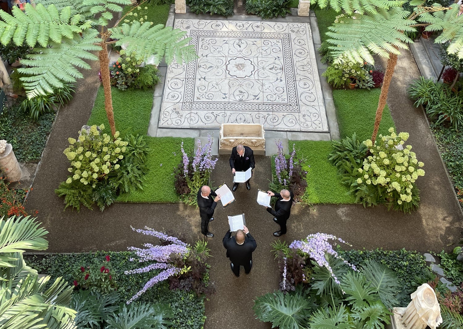 The New York Polyphony performing in the Isabella Stewart Gardner Museum Courtyard.