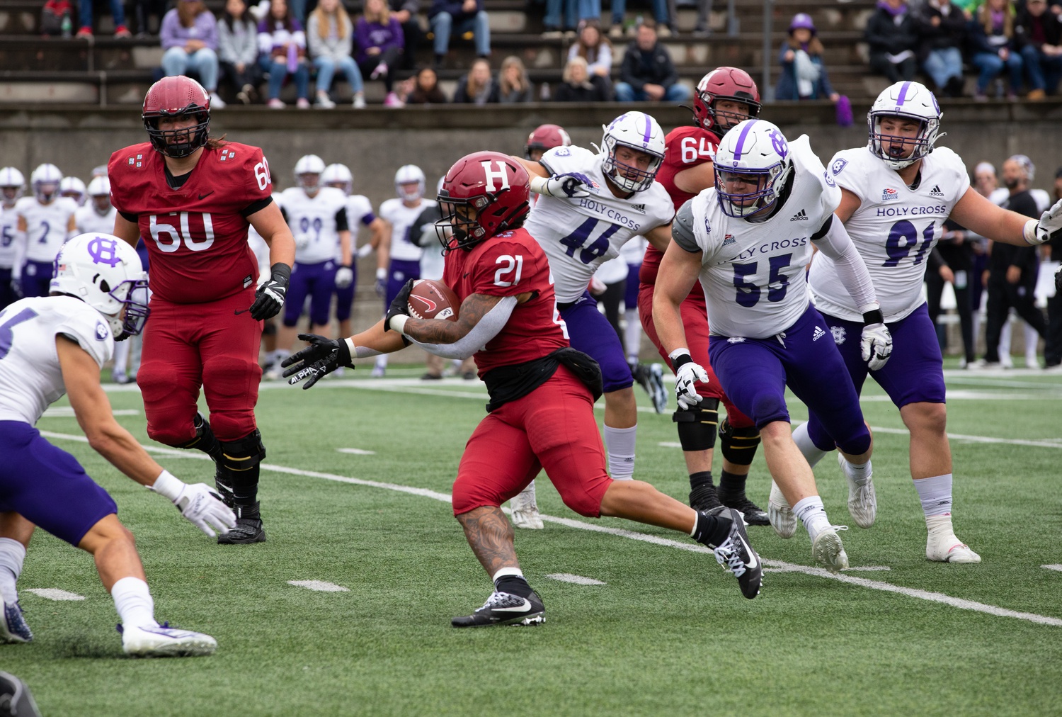 Borguet sidesteps his way through the Holy Cross defense on his way to a touchdown in the first quarter on Saturday. Borguet scored his fourth and fifth rushing touchdowns of the year in the contest.