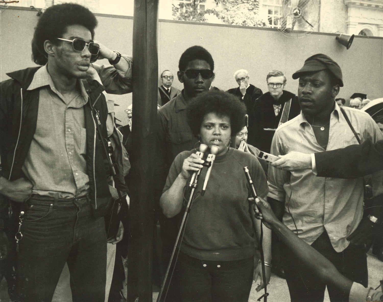 Saundra Graham speaks into the microphone during a protest at Harvard's Commencement on June 11, 1970.