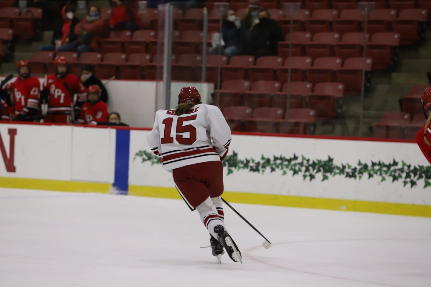 Harvard forward Becca Gilmore '22 skates down the ice during a 4-3 win over RPI on Dec. 4, 2021. The onus to replace Gilmore's contributions will fall on younger members of the Crimson squad.