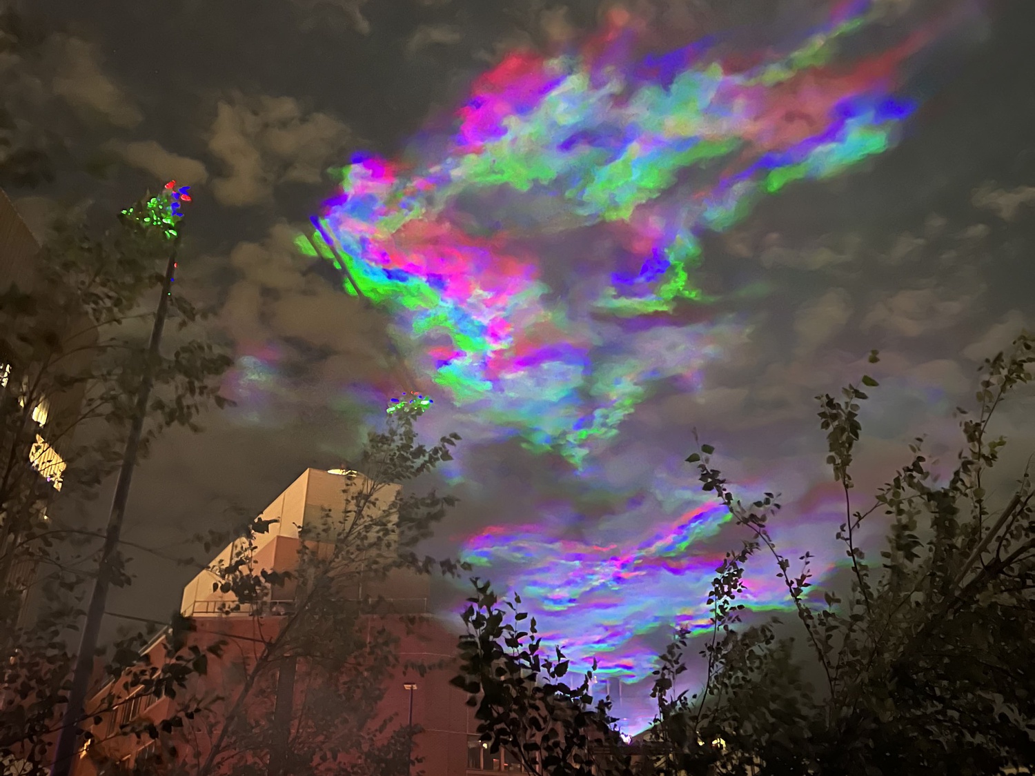 Borealis, an art installation that served as the centerpiece of this year's Cambridge Science Festival, simulates Northern Lights by projecting light beams onto mist.