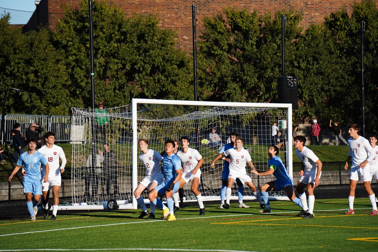 Three Harvard defenders guard the goal against a corner kick from Columbia. The teams tied 1-1 on Saturday.