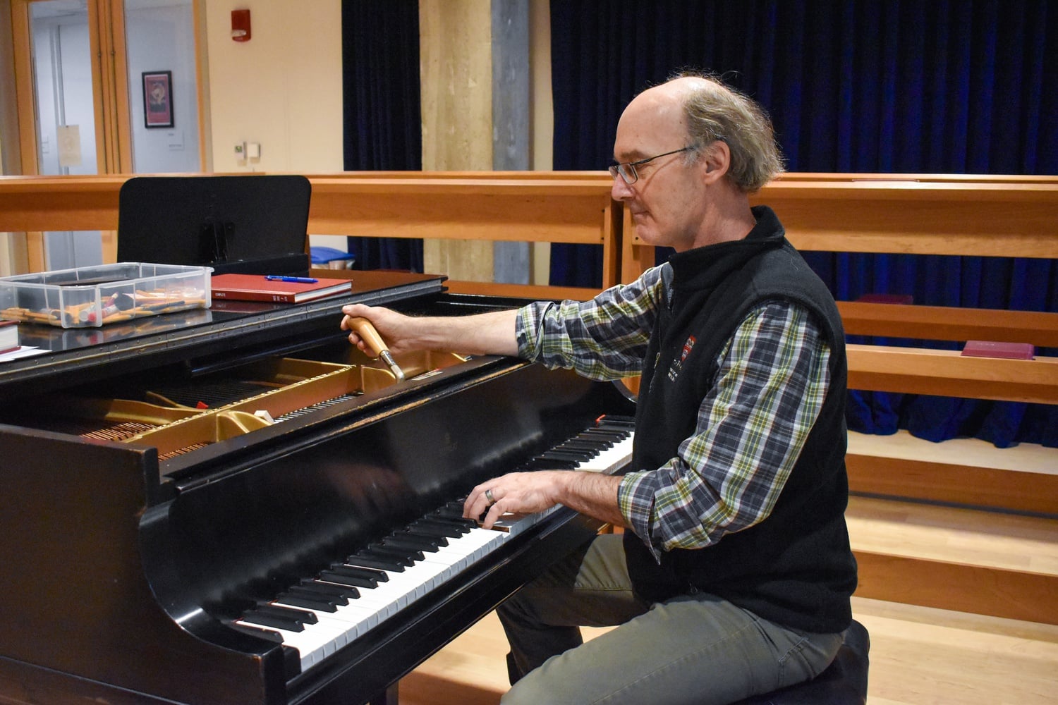 Piano technician Austin L. Grimes got his start as a pianist, then soon wanted to learn how to tune his own instrument.