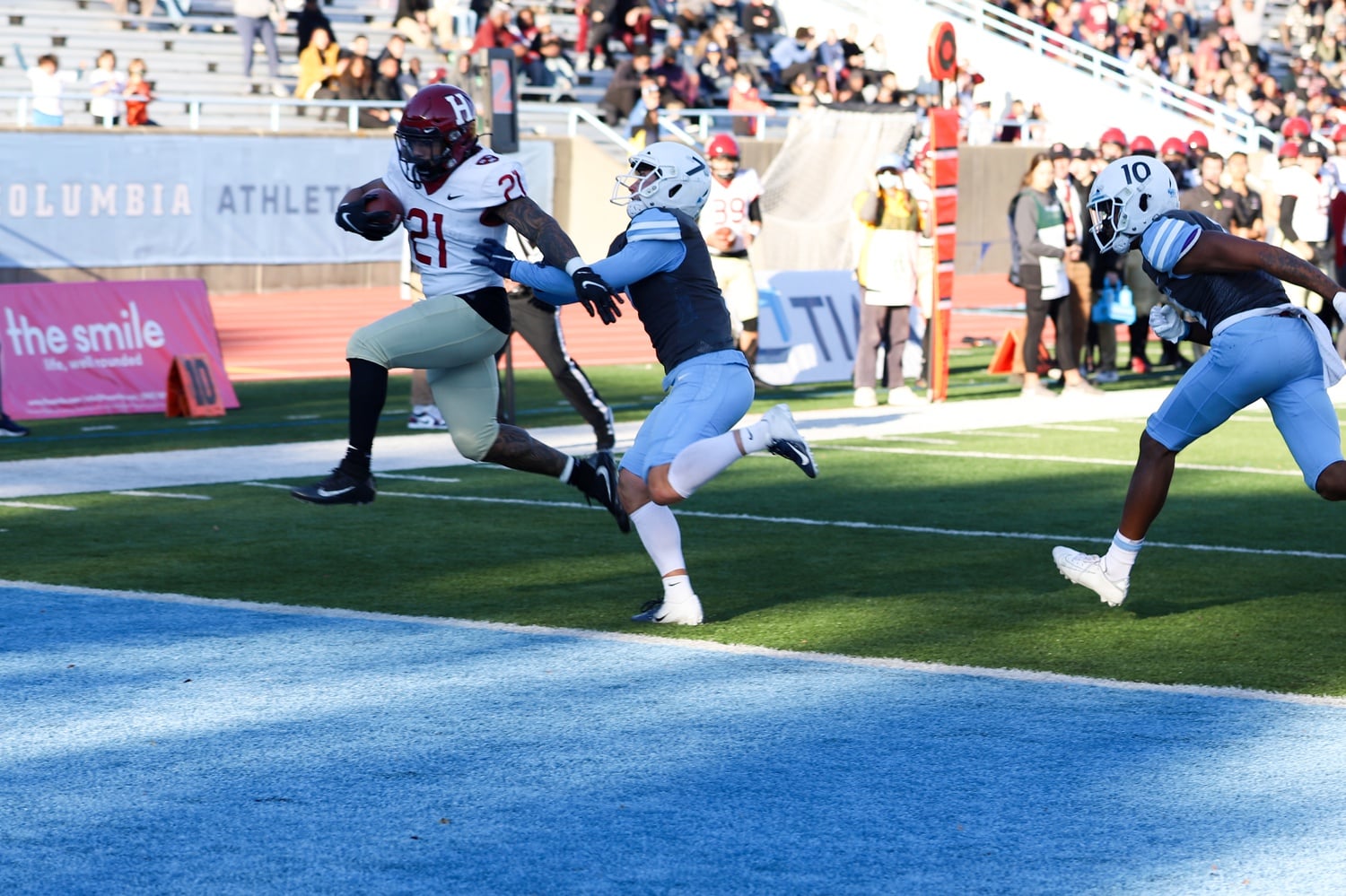 Senior running back Aidan Borguet dashes around the right edge for a touchdown in a 49-21 victory over Columbia on Nov. 6, 2021. Borguet is the star of a Crimson offense that will need to break the Tigers' iron-clad run defense to have any chance of victory on Friday.
