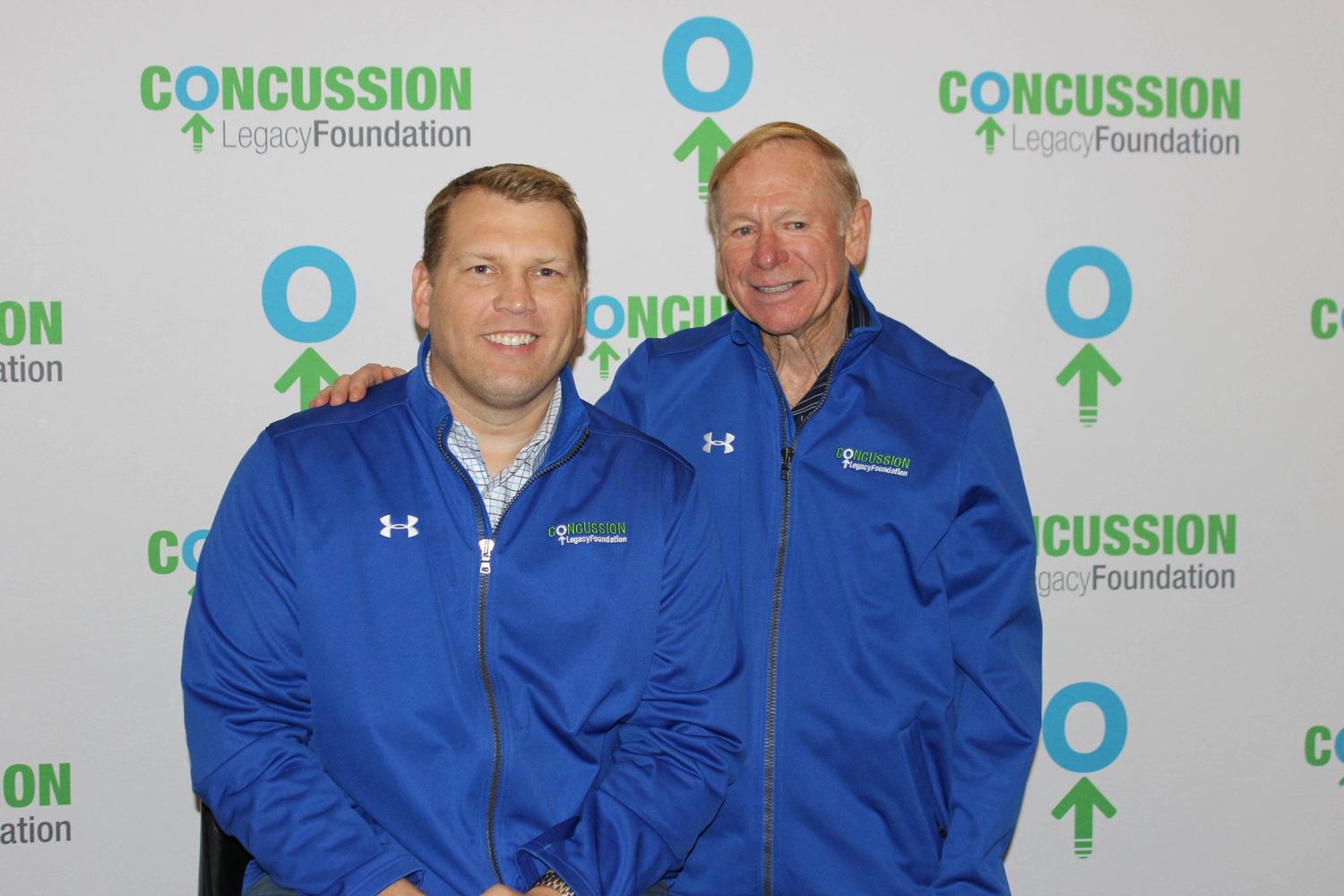 Christopher J. Nowinski '00, a former Harvard football player, and Robert Cantu, the doctor who treated Nowinski's concussions, at an event for the Concussion Legacy Foundation, a non-profit they co-founded to change the culture around consussions in athletics.