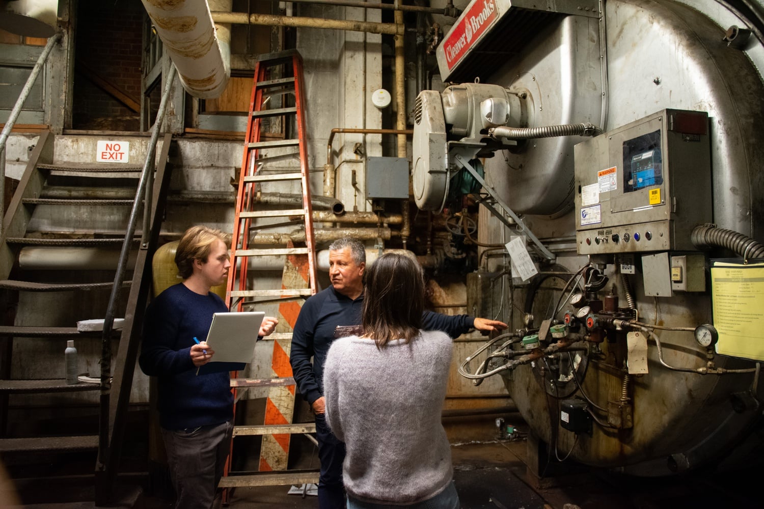 Sabbio gives the writers a tour of the complex boiler system.