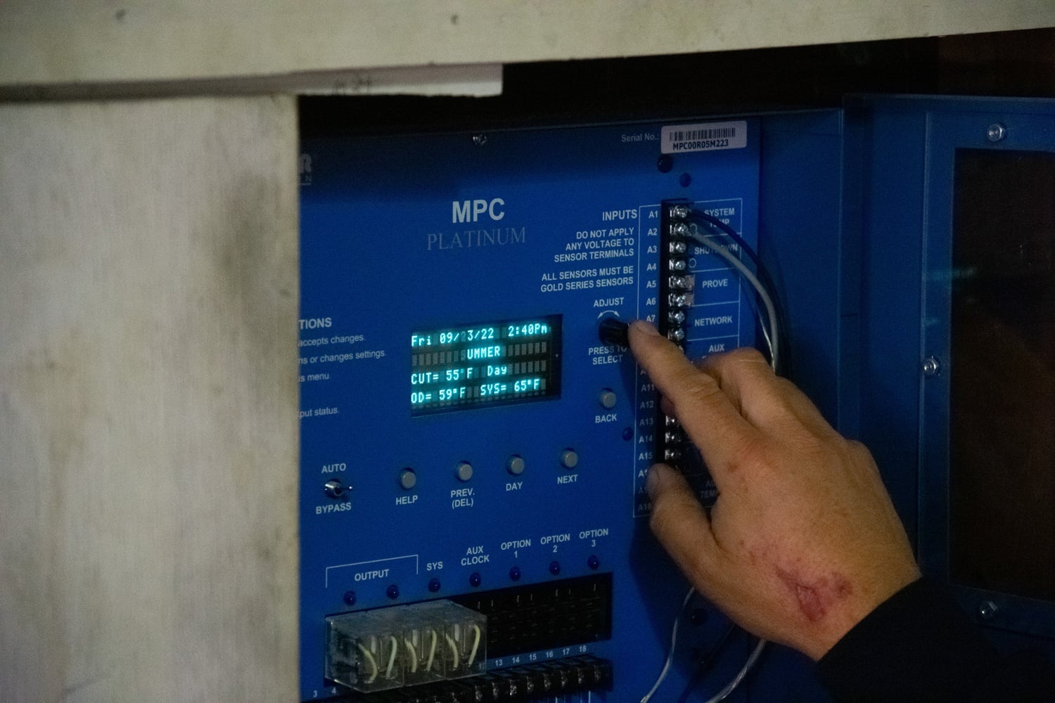 A burn mark on Sabbio's hand attests to the dangers of the job.