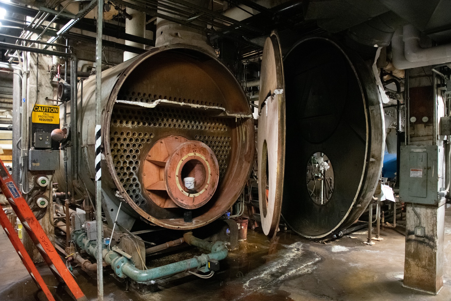 Each boiler is studded with cylindrical holes about two inches across.