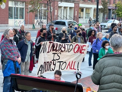 Cover image for Cambridge Activists Protest Police Brutality at City Hall Demonstration