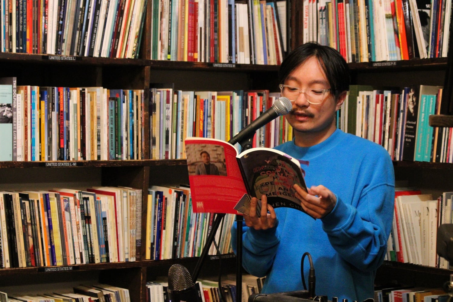 Chen Chen reads from “Your Emergency Contact Has Experienced An Emergency" at the Grolier Poetry Book Shop.