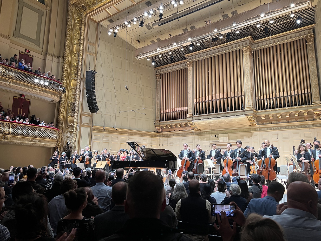 Pianist Yuja Wang on stage at Symphony Hall with the Boston Symphony Orchestra.