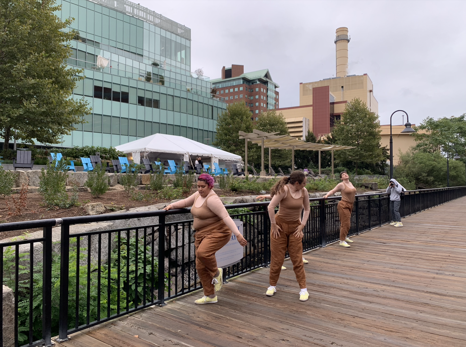 Dancers performing in "Emotive Land" along the Charles River.