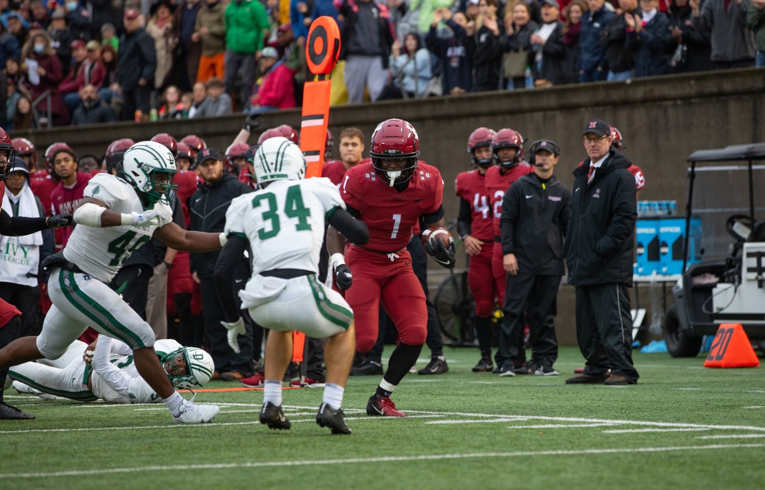 Senior wide receiver Kym Wimberly looks to make a move against a Dartmouth defensive back in a 20-17 loss to the Big Green on Oct. 30, 2021. This season, Wimberly has hauled in 45 passes for 528 yards and three scores.