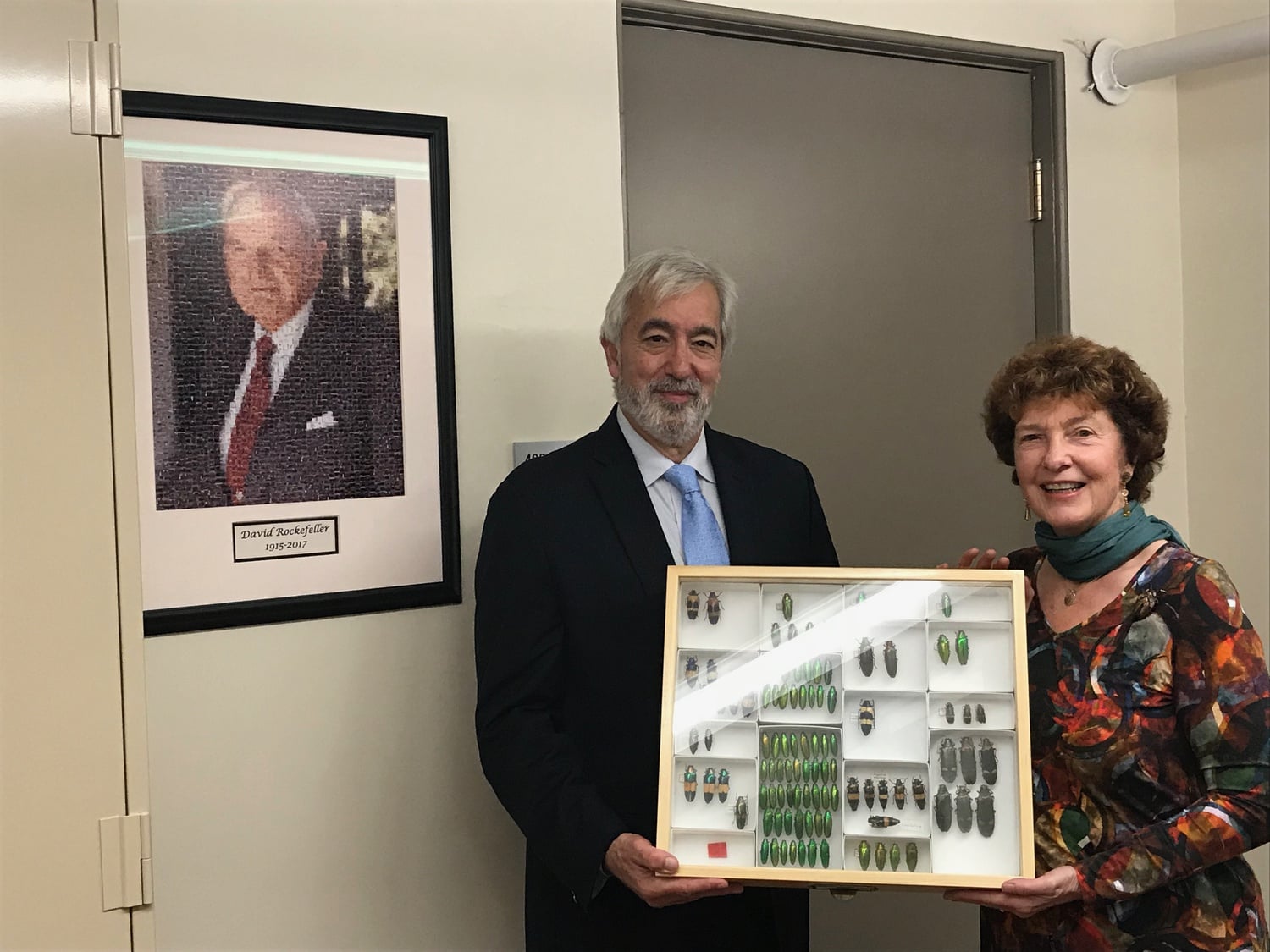 Professor Brian Farrell receives David Rockefeller's beetle collection — about 150,000 specimens strong — from Eileen Rockefeller in 2017.