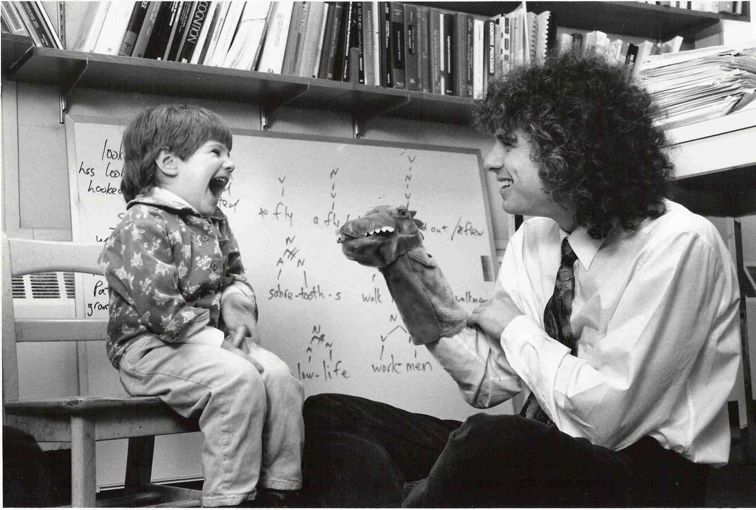 Steven A. Pinker testing a young child in his office at MIT in 1990, where he worked as a professor in the Department of Brain and Cognitive Sciences.