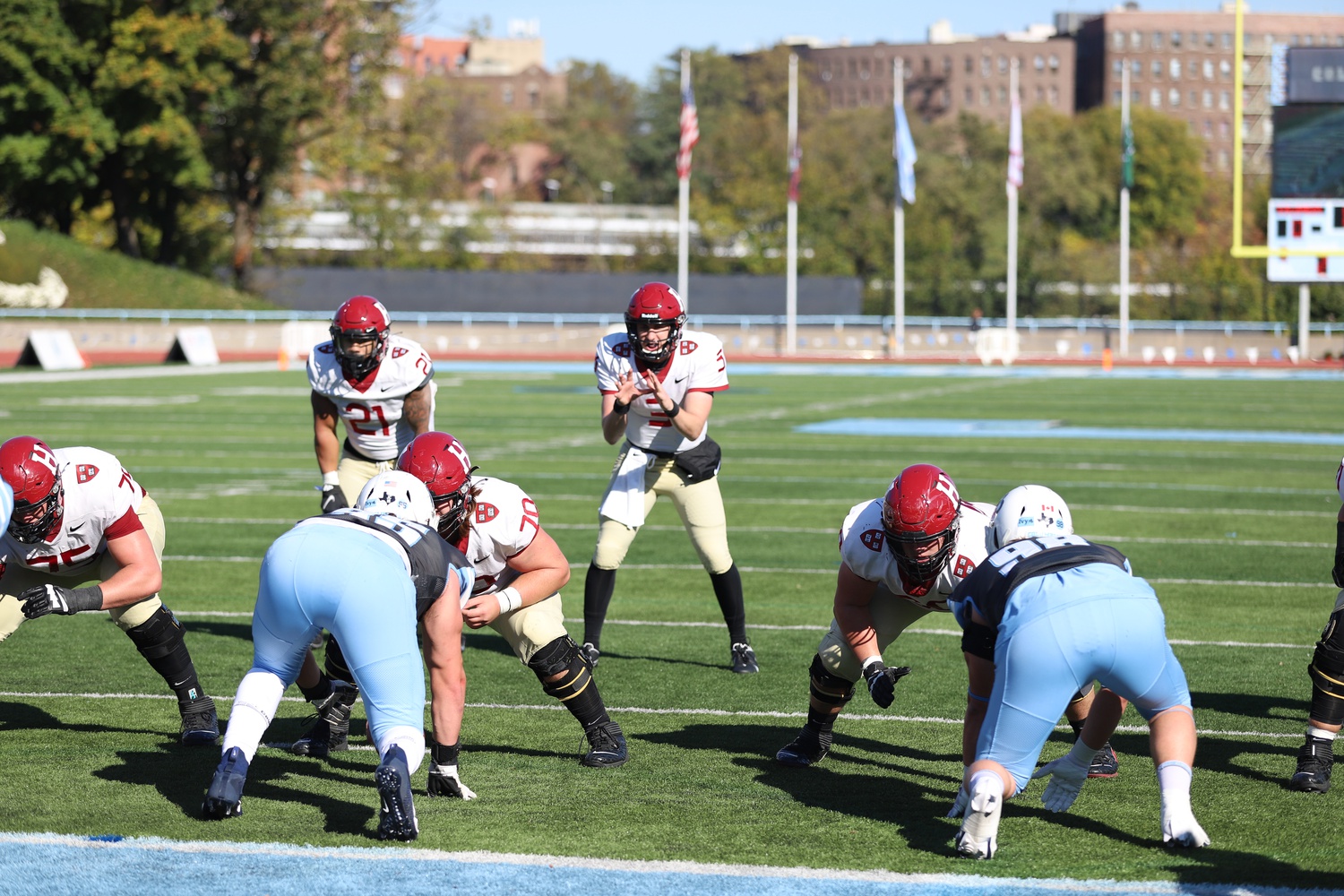 Senior quarterback Luke Emge lines up for a snap in a 49-21 victory over Columbia on Nov. 6, 2021. Emge led the Crimson to victory over Dartmouth last week in a game senior quarterback Charlie Dean missed with an injury.