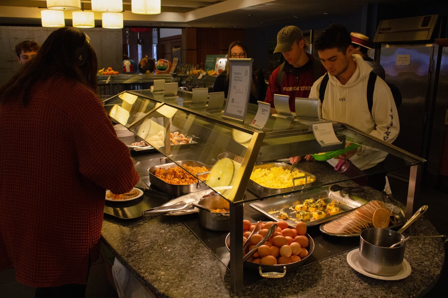 Everyone lines up for hot breakfast in Quincy dhall.