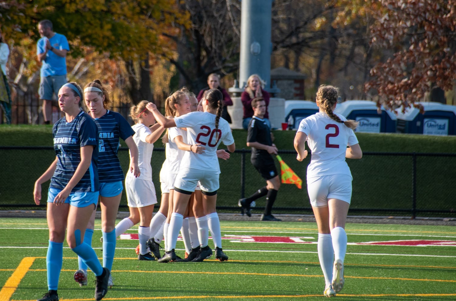 Senior Sophie Hirst hugs senior Hannah Griffin after Griffin scores the first goal of the game in the eighth minute.